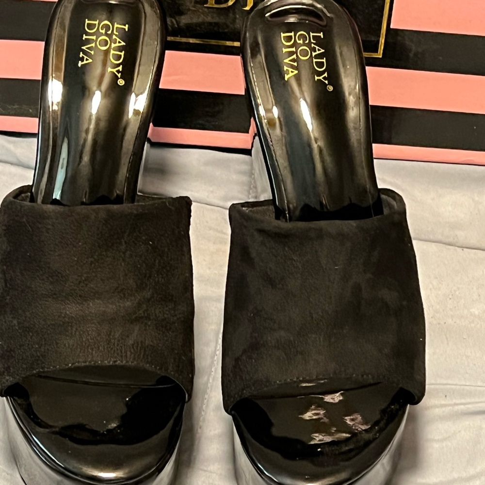 Seriously tall wedge platforms, black,size 8. Bought online tried on at home.